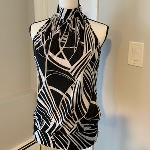 Sleeveless high neck blouse